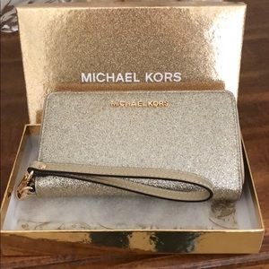 brand new michael kors wristlet with strap